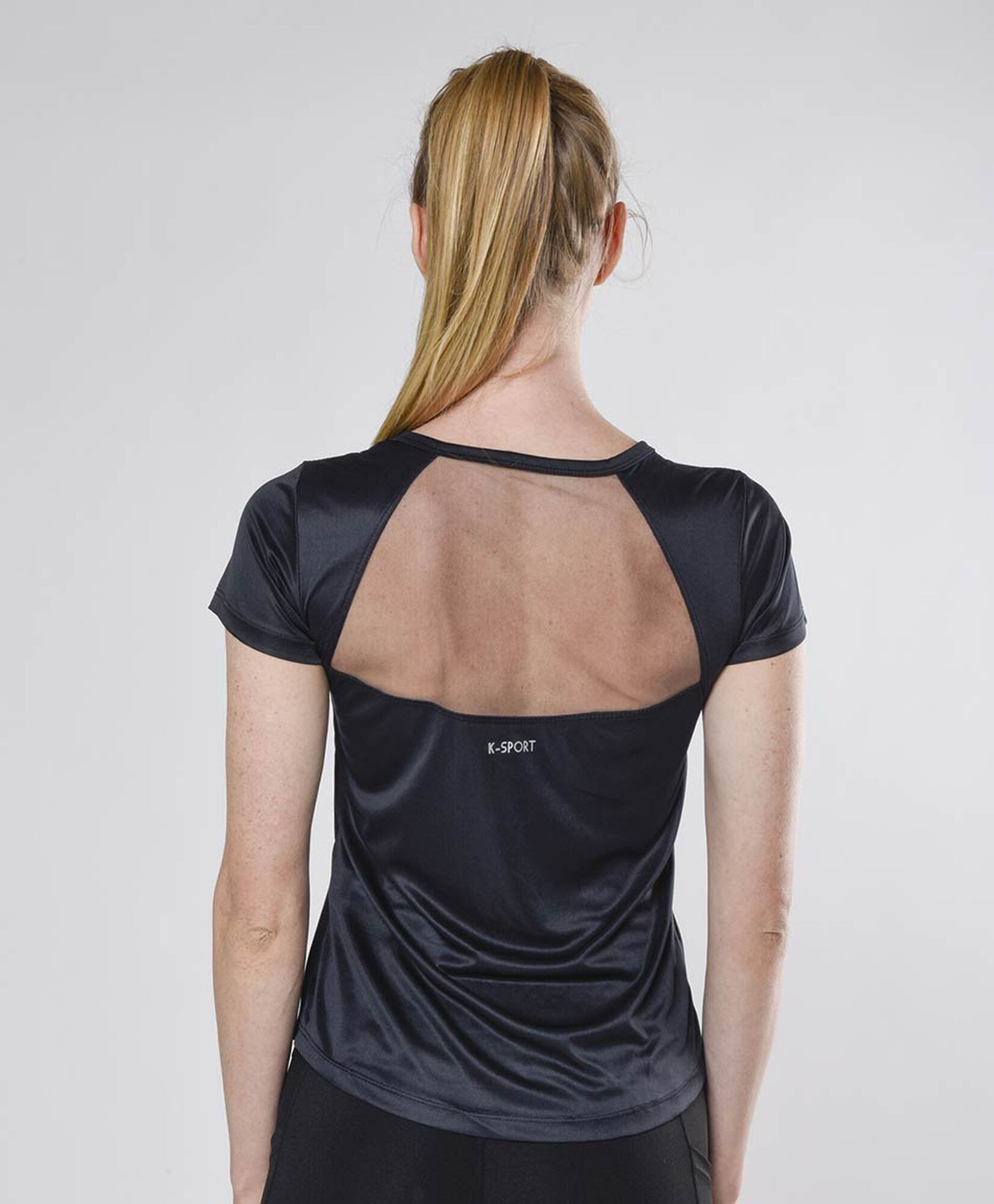 Polera deportiva mujer espalda mesh Polera deportiva mujer espalda mesh