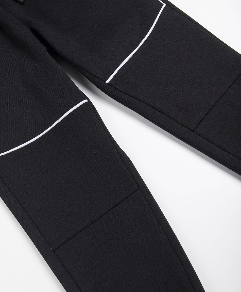 Pantal&oacute;n buzo ni&ntilde;o l&iacute;neas contraste
