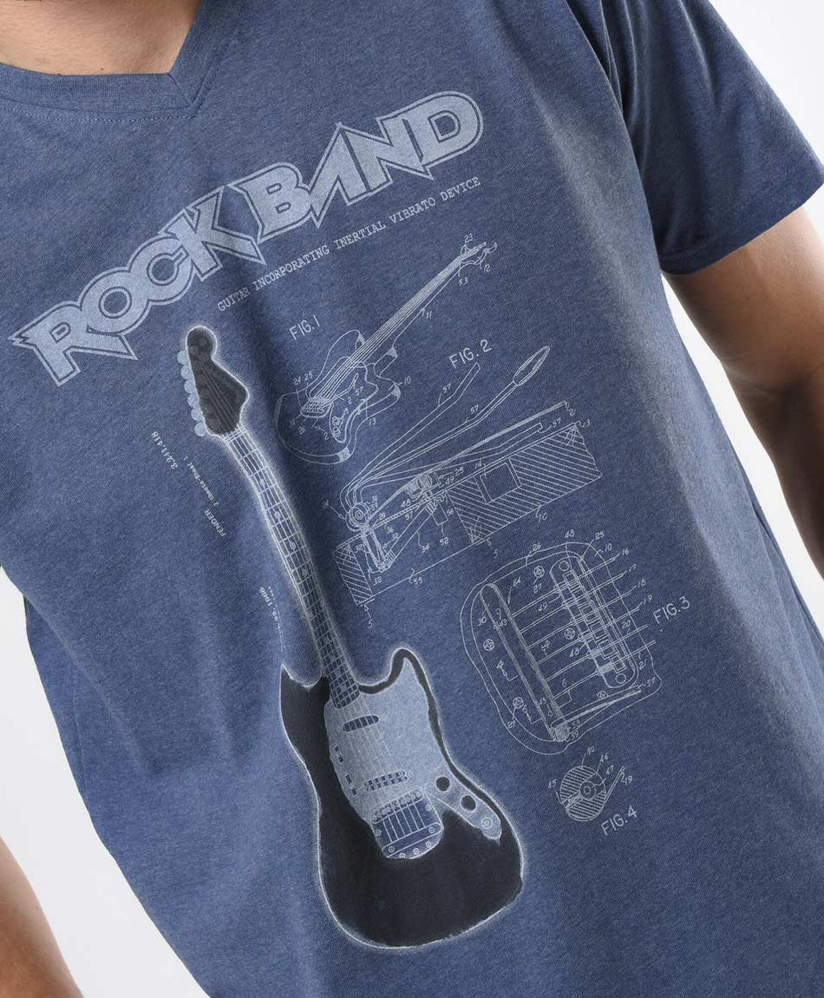 Polera hombre jaspeada guitarra Polera hombre jaspeada guitarra