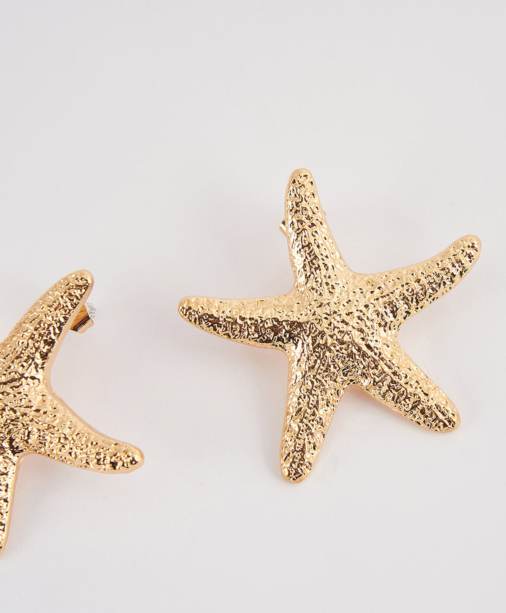 Aros mujer estrella de mar Aros mujer estrella de mar