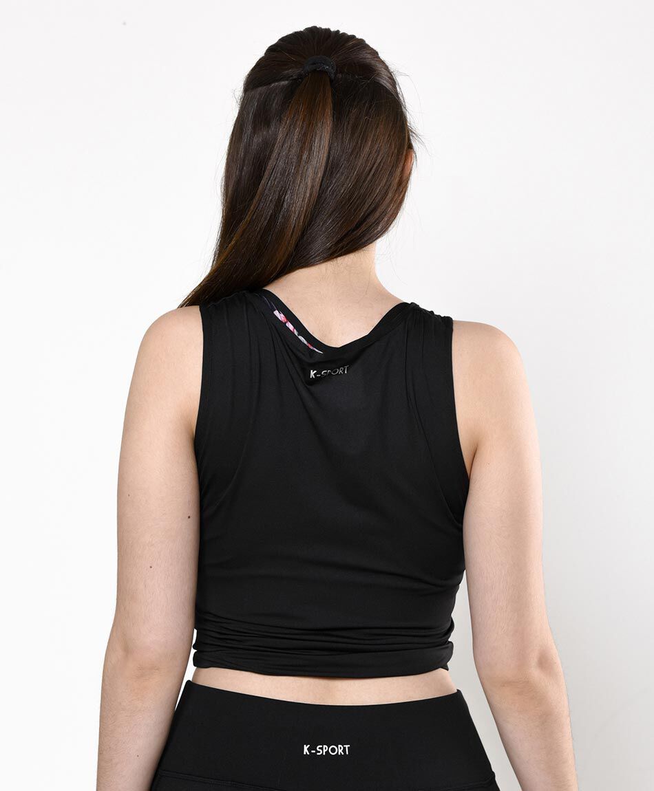 Polera deportiva ajustada sin mangas cuello redondo