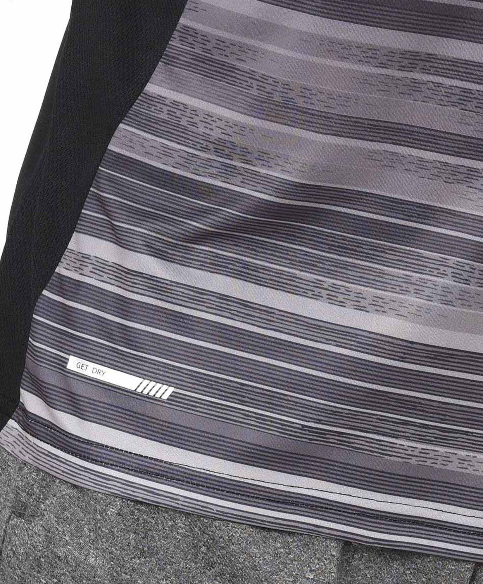 Polera deportiva hombre líneas bicolor Polera deportiva hombre líneas bicolor