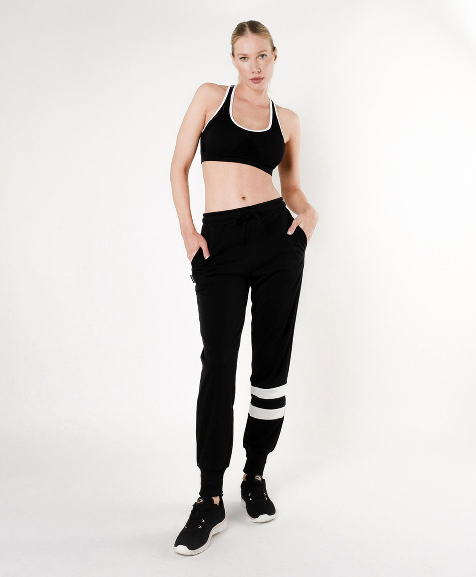 Pantalón de buzo mujer franjas skinny fit Pantalón de buzo mujer franjas skinny fit