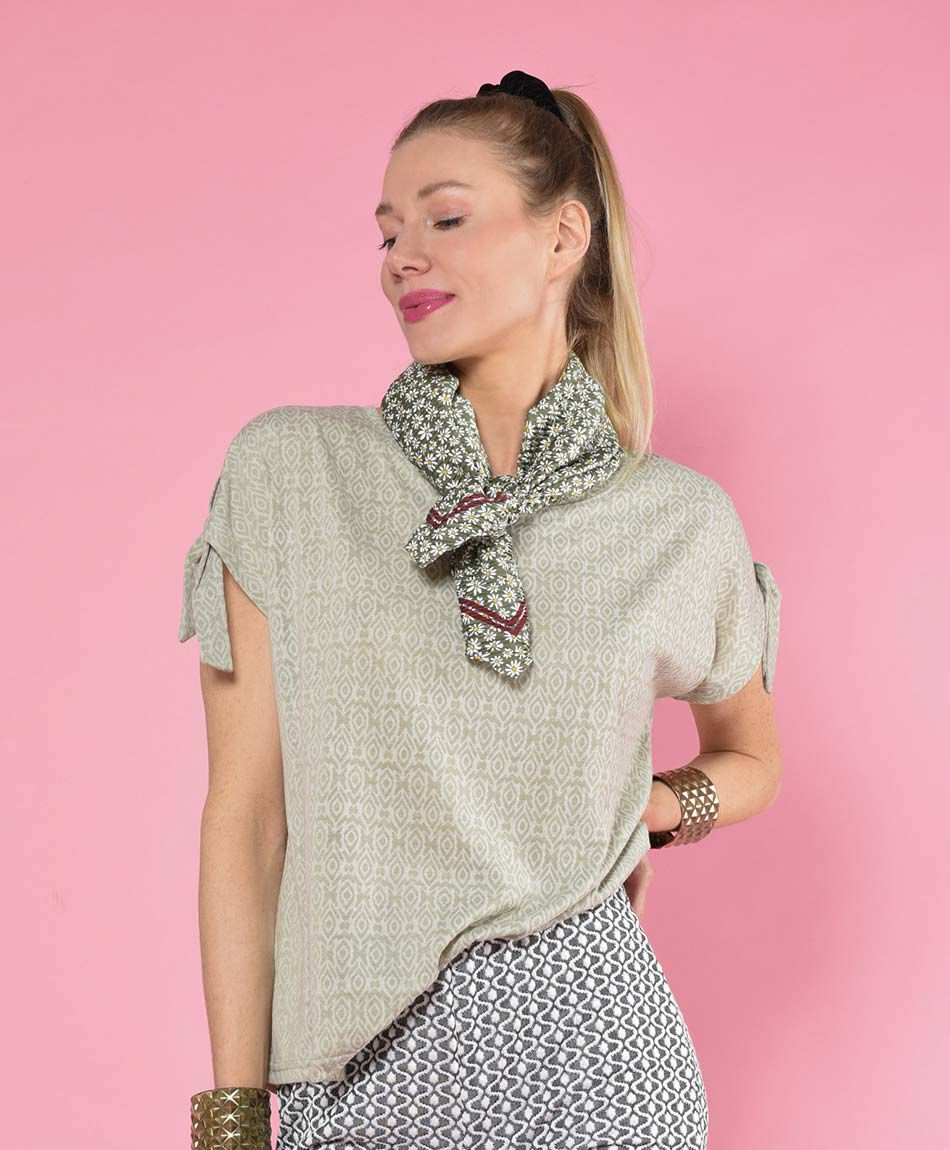 Polera oversize manga corta cuello redondo