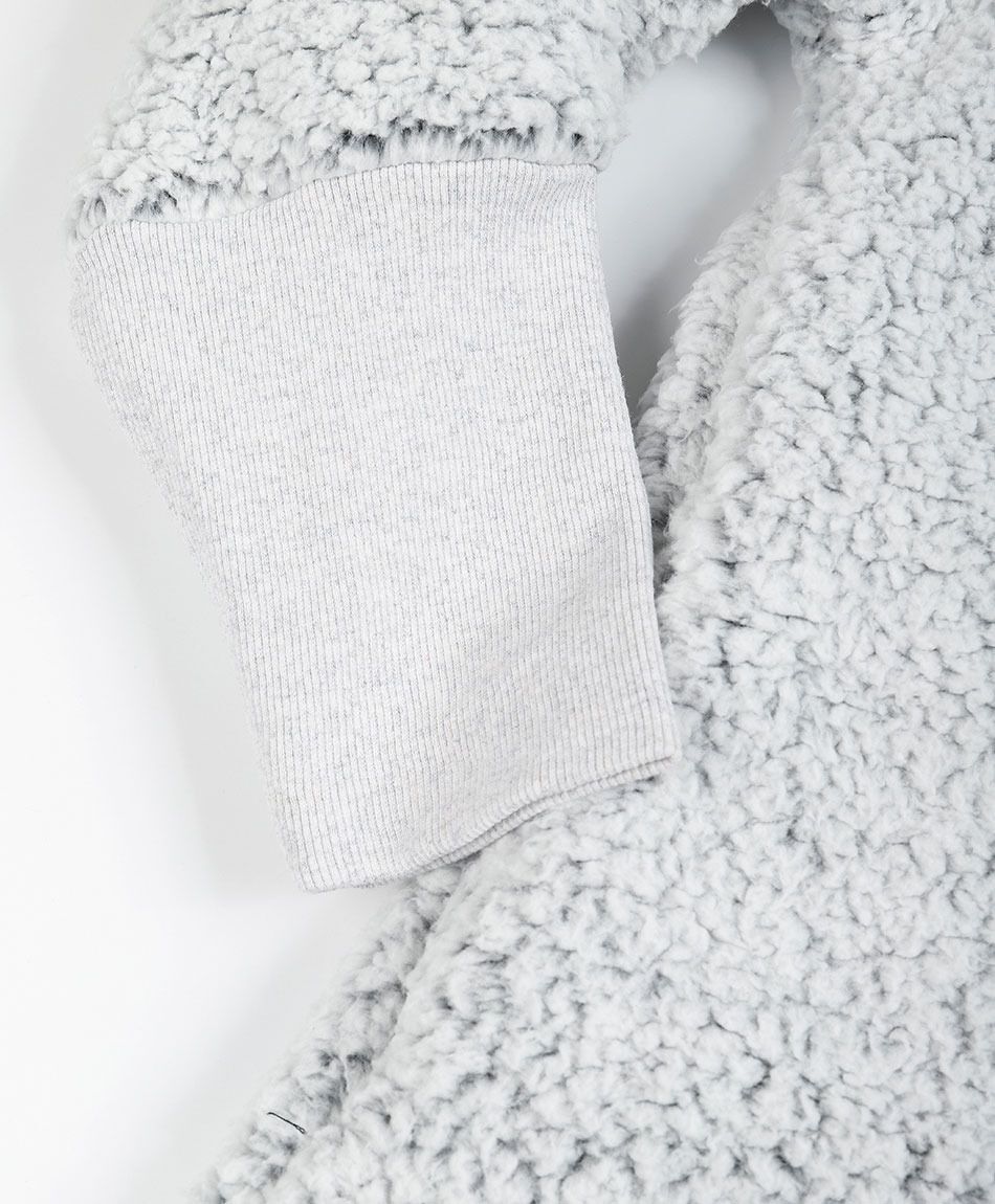 Poler&oacute;n manta mujer pompones oversize