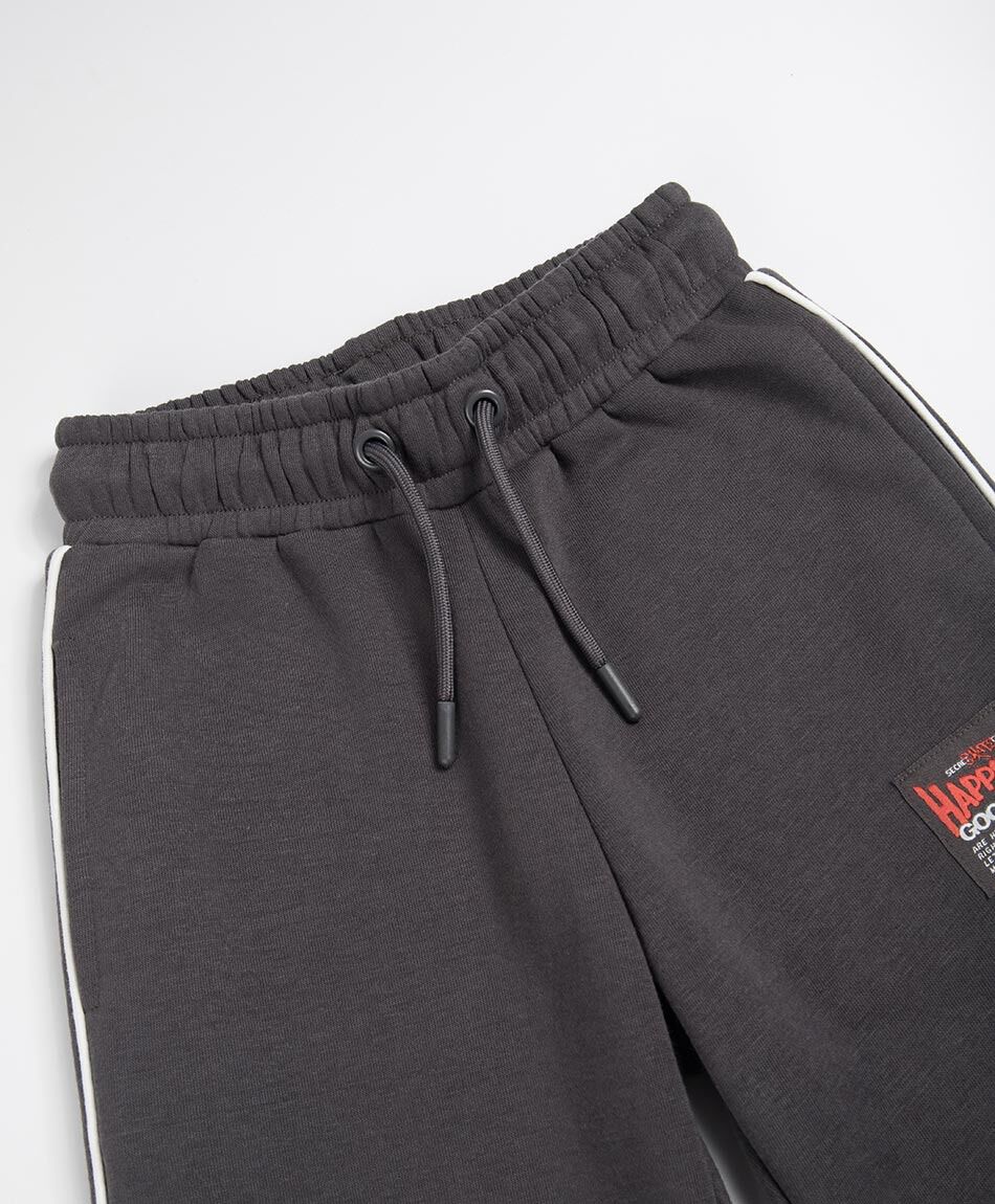 Pantal&oacute;n buzo ni&ntilde;o l&iacute;neas blancas