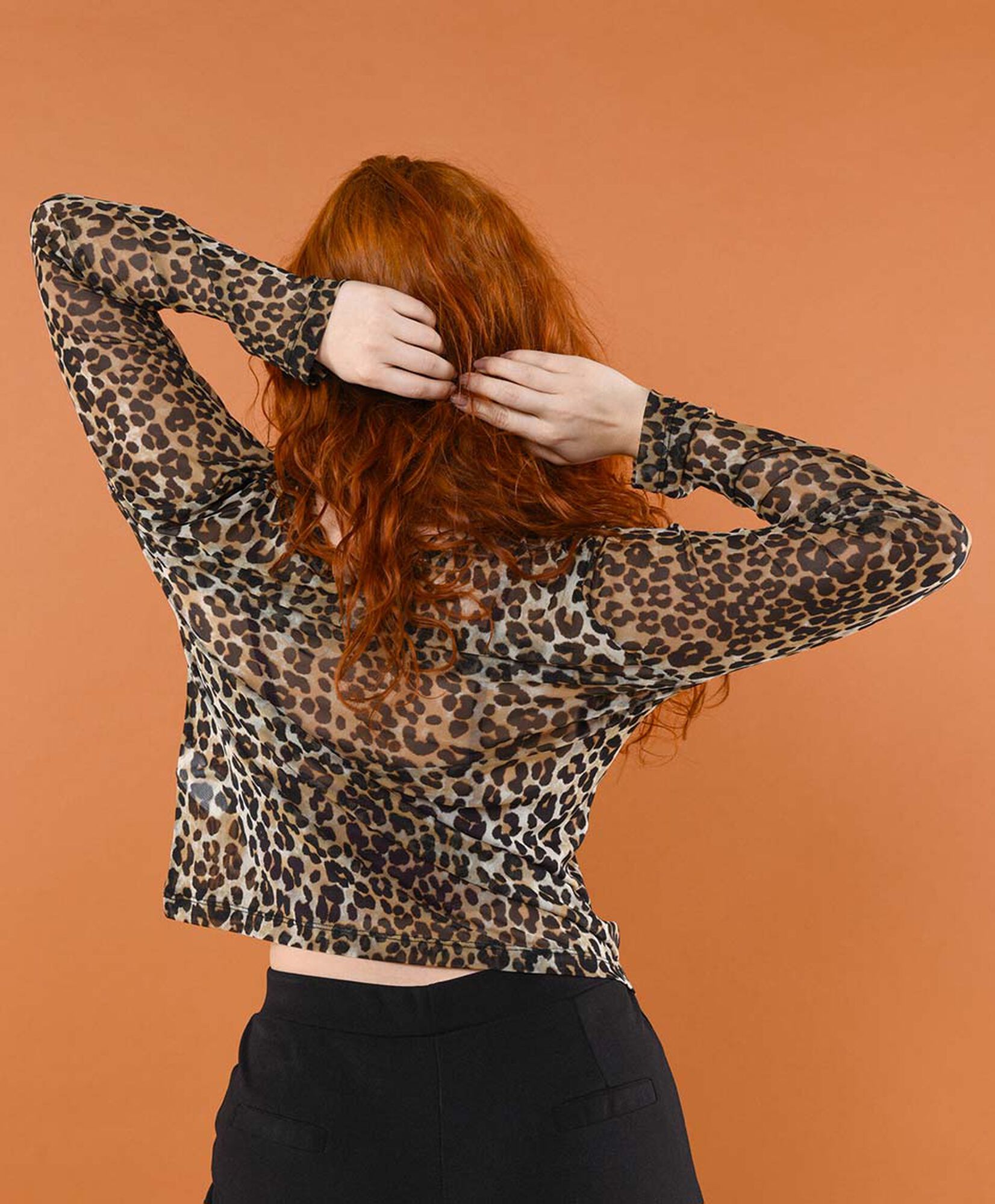 Polera mujer mesh animal print Polera mujer mesh animal print