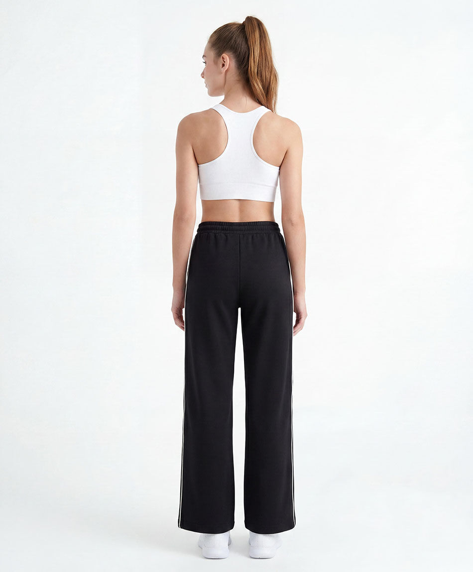 Pantal&oacute;n deportivo mujer l&iacute;neas blancas