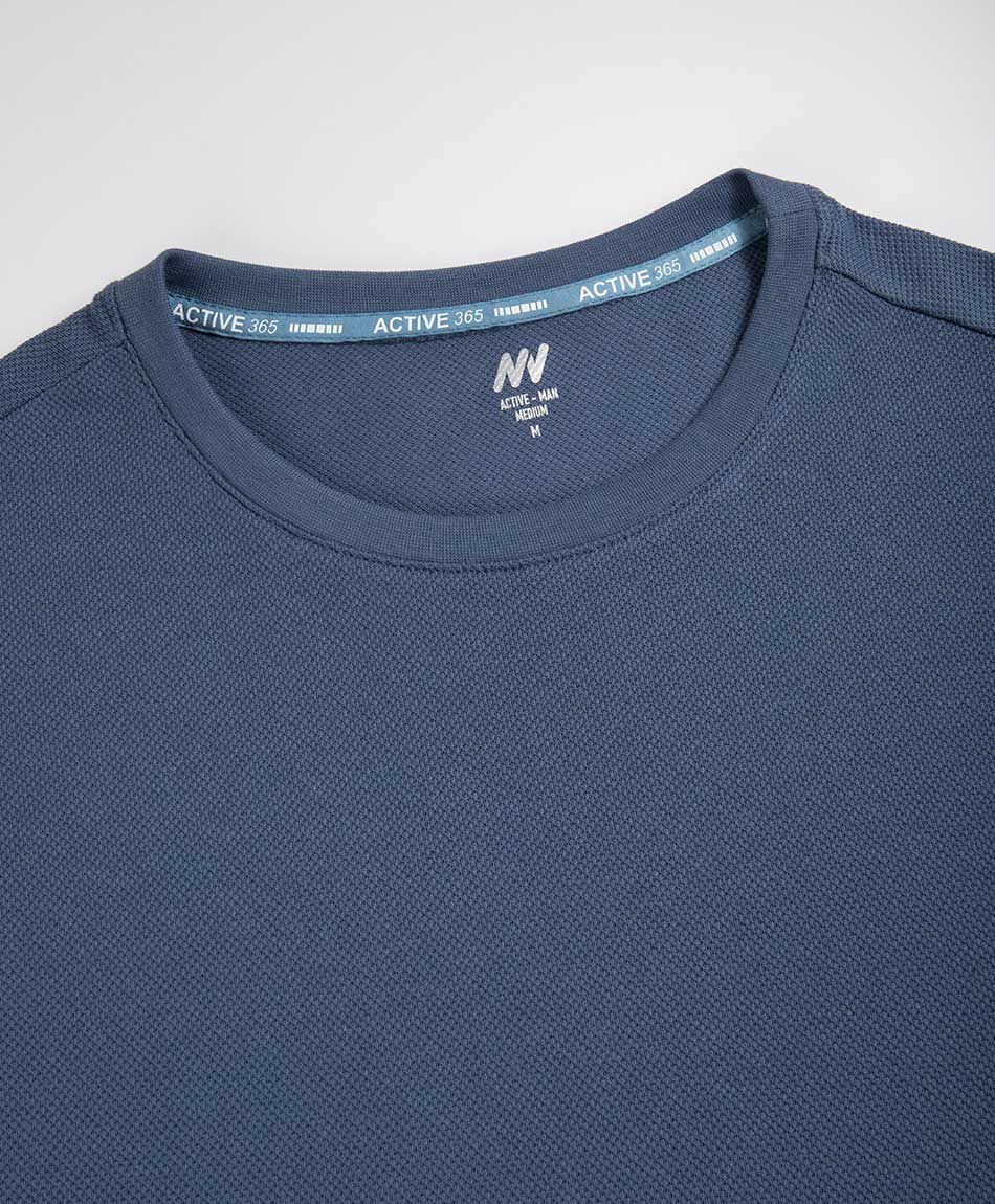 Polera deportiva hombre teturizada azul