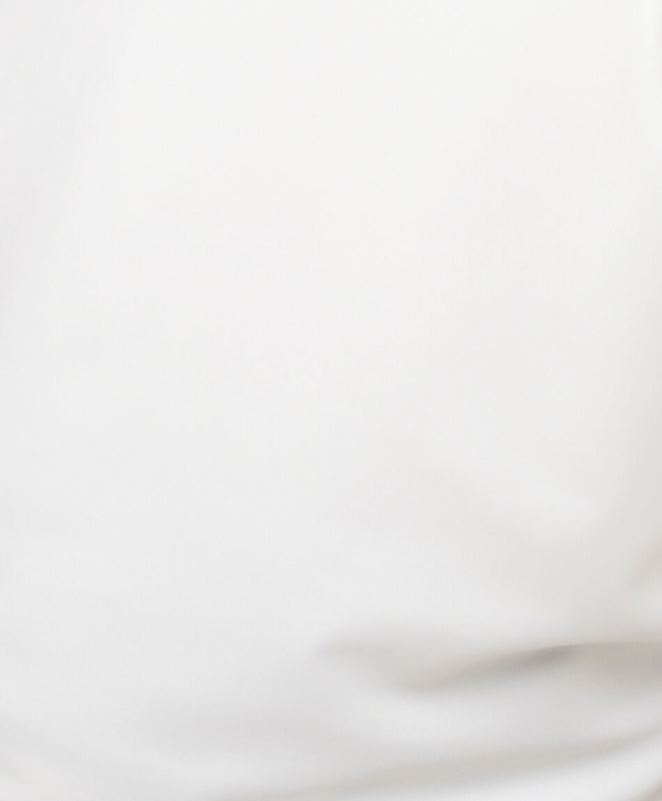 Polera mujer asim&eacute;trica blanca