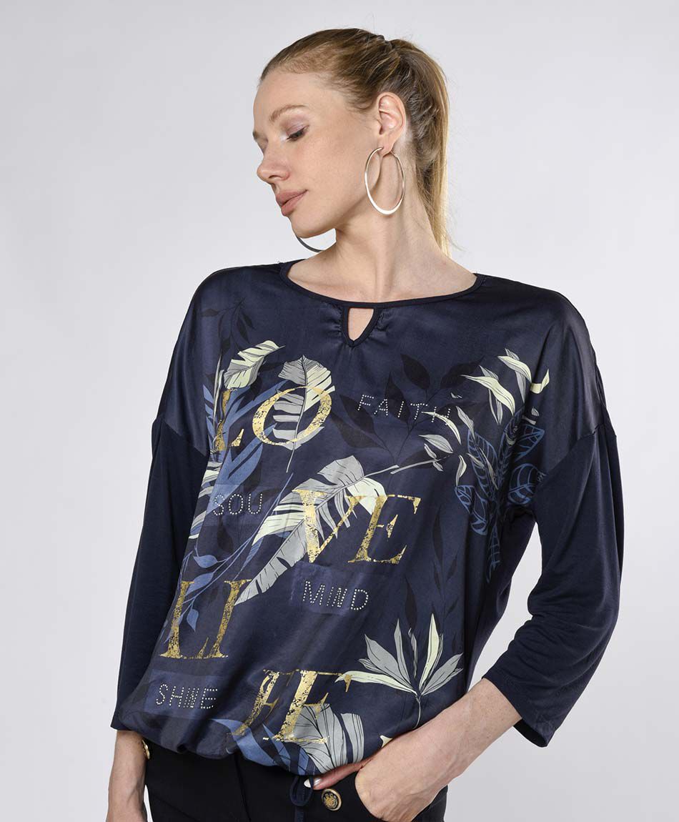 Polera mujer hojas y tachitas