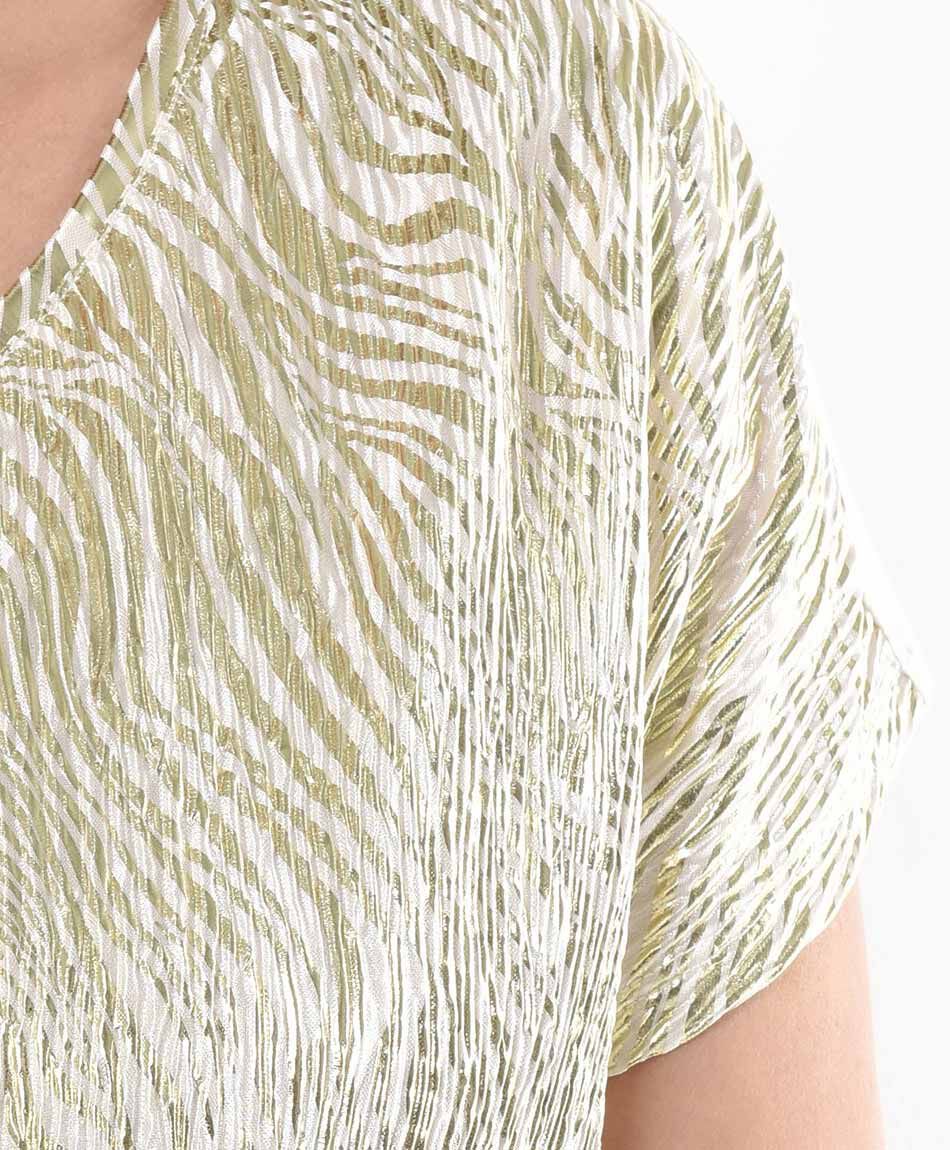 Polera mujer animal print dorado oversize