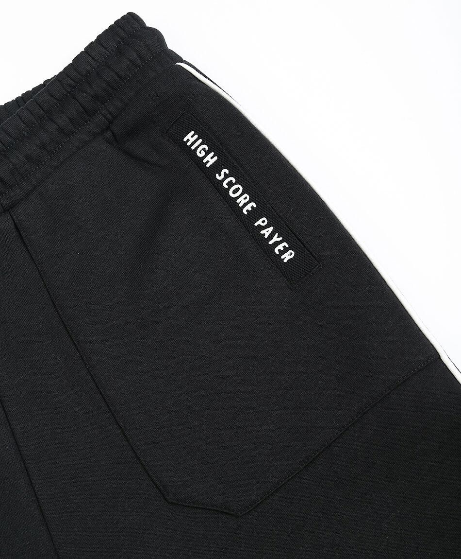 Pantal&oacute;n buzo ni&ntilde;o l&iacute;nea blanca