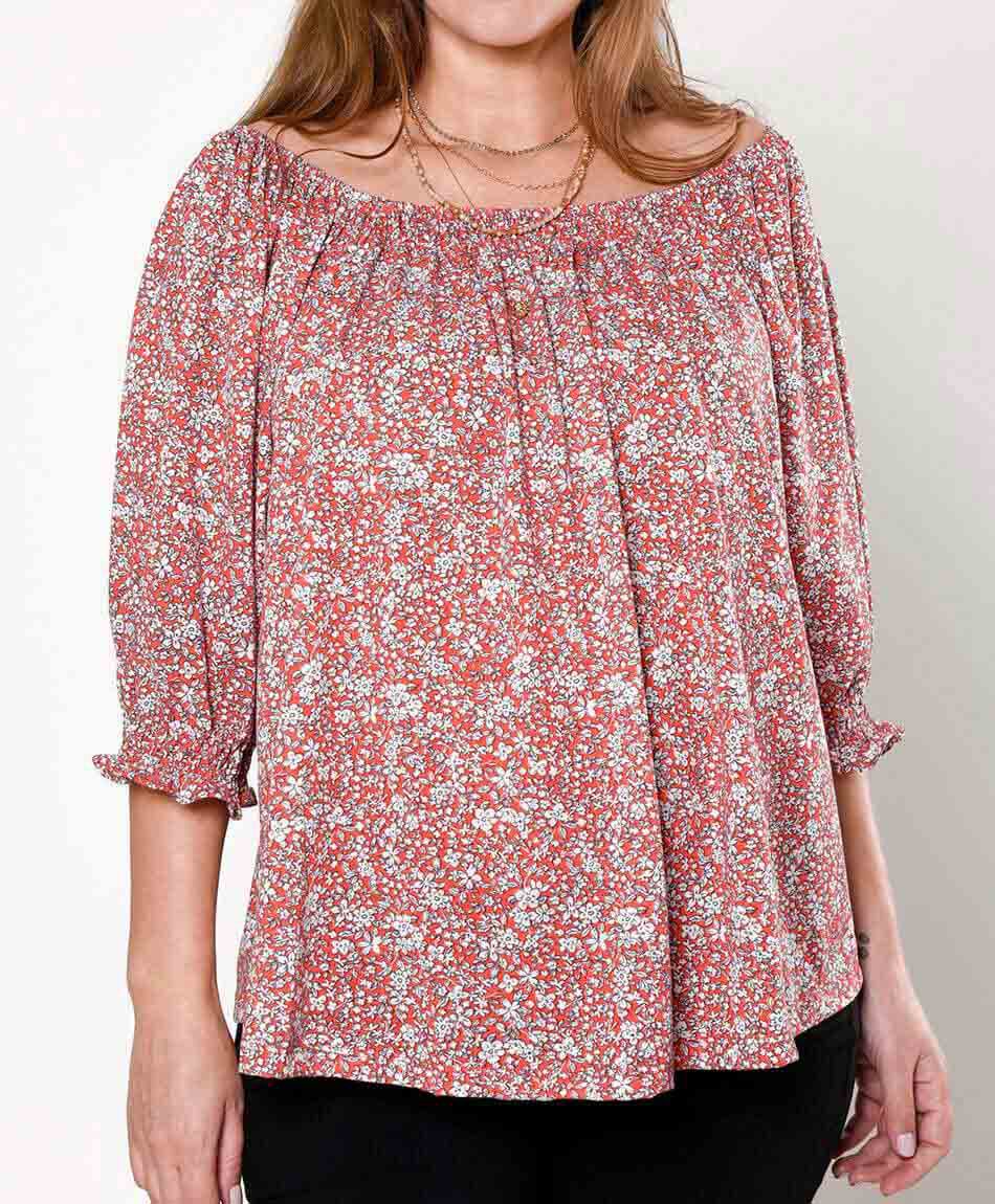 Polera oversize manga al codo cuello off shoulder