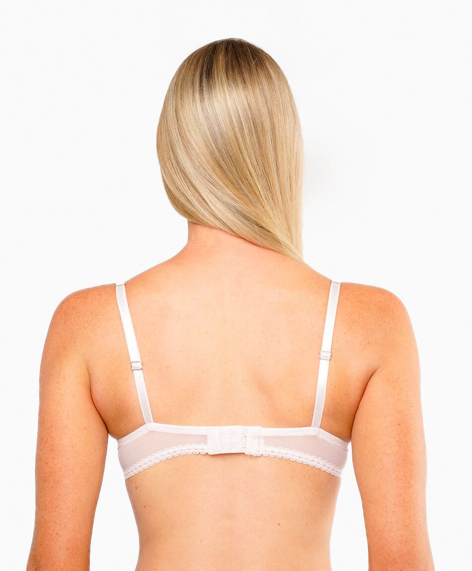 Sost&eacute;n mujer flores bordadas