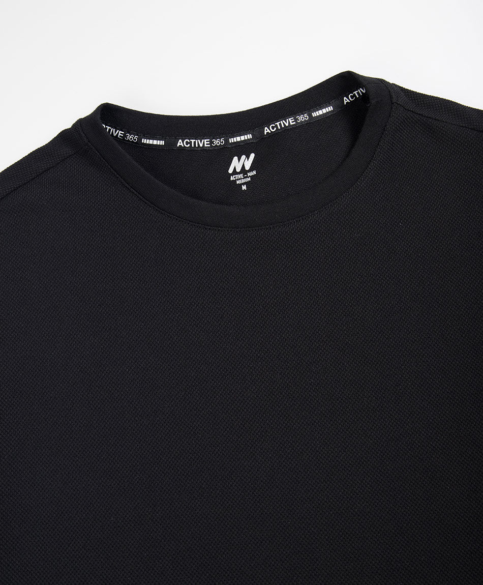 Polera deportiva texturizada negra