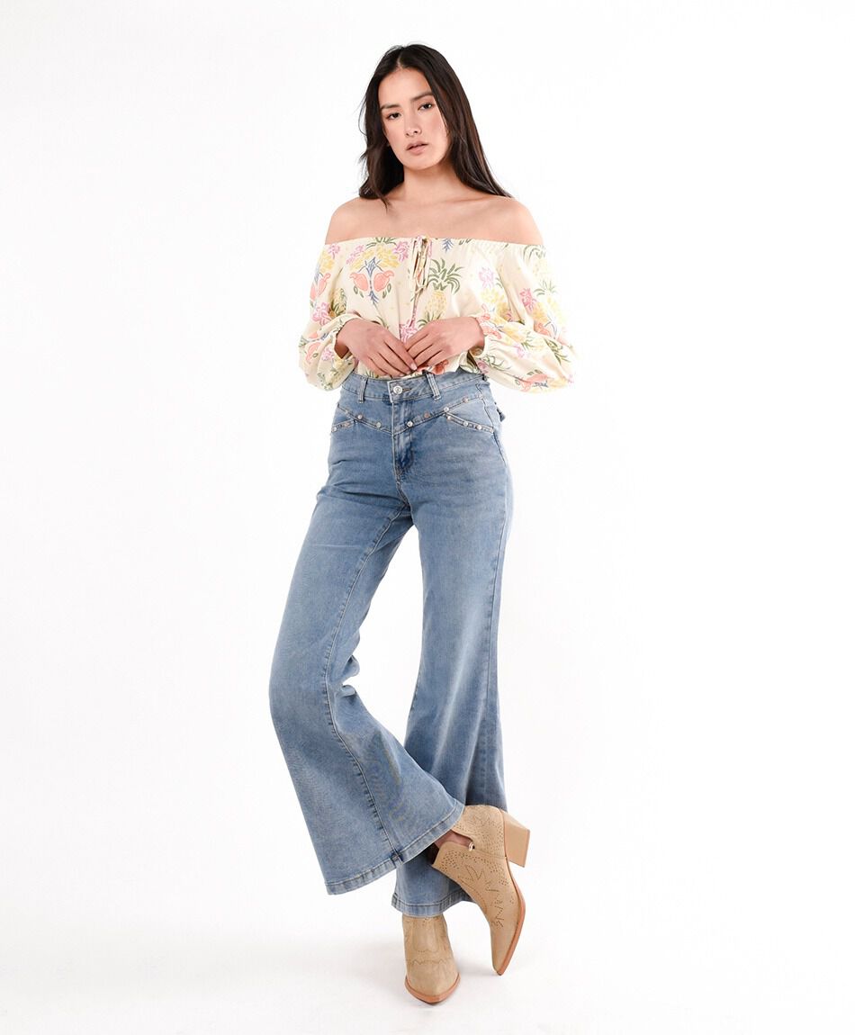 Jeans mujer tachas redondas flare