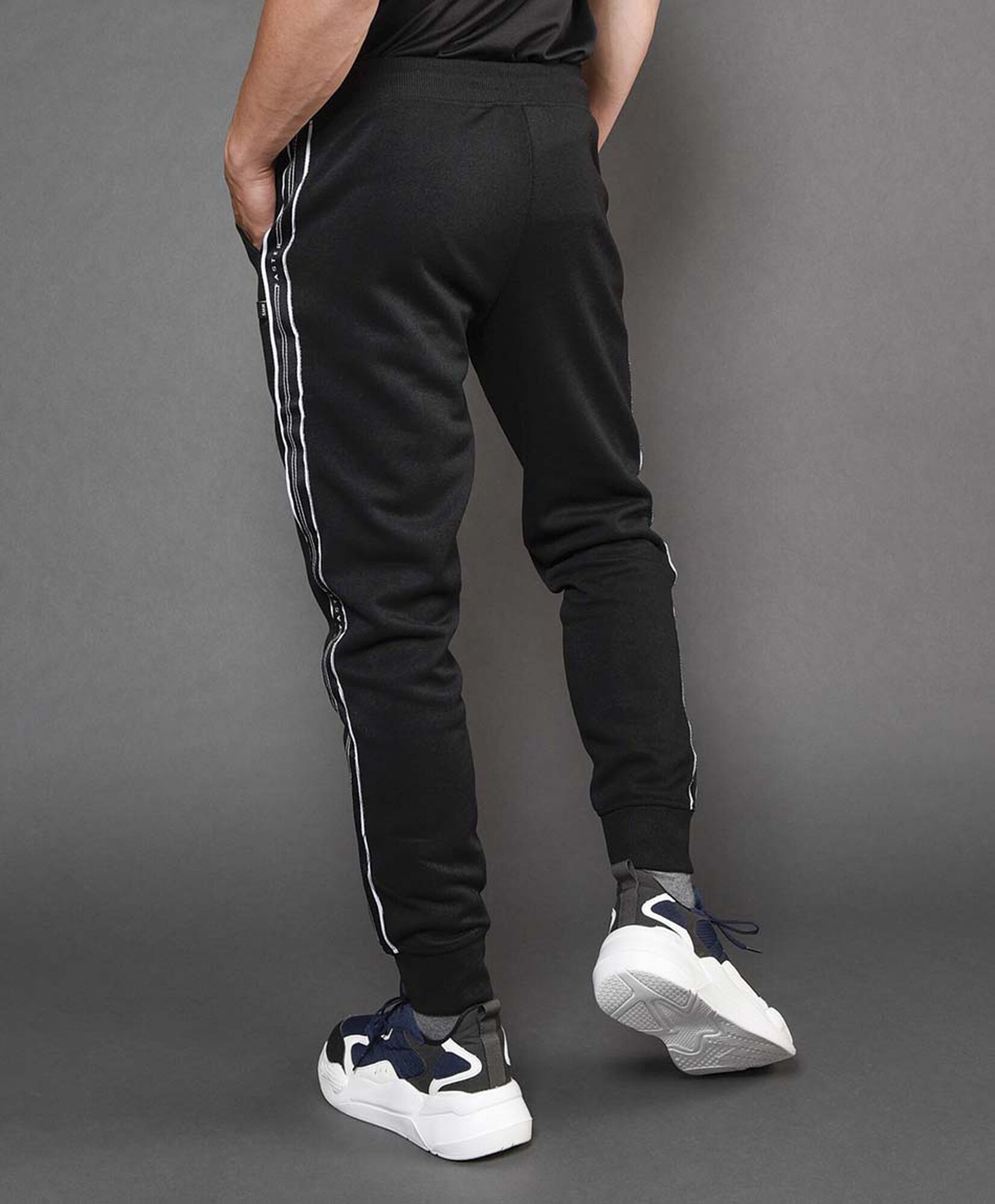 Pantalón de buzo hombre deportivo franja lateral Pantalón de buzo hombre deportivo franja lateral