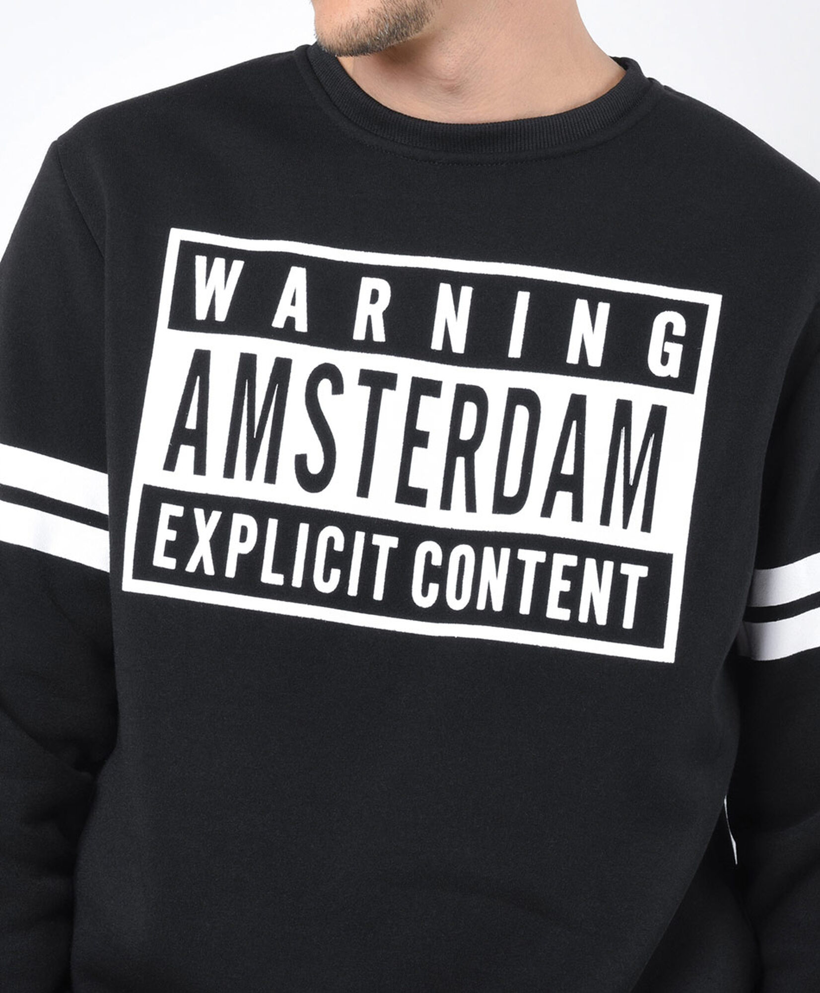 Polerón hombre estampado y líneas Polerón hombre estampado y líneas