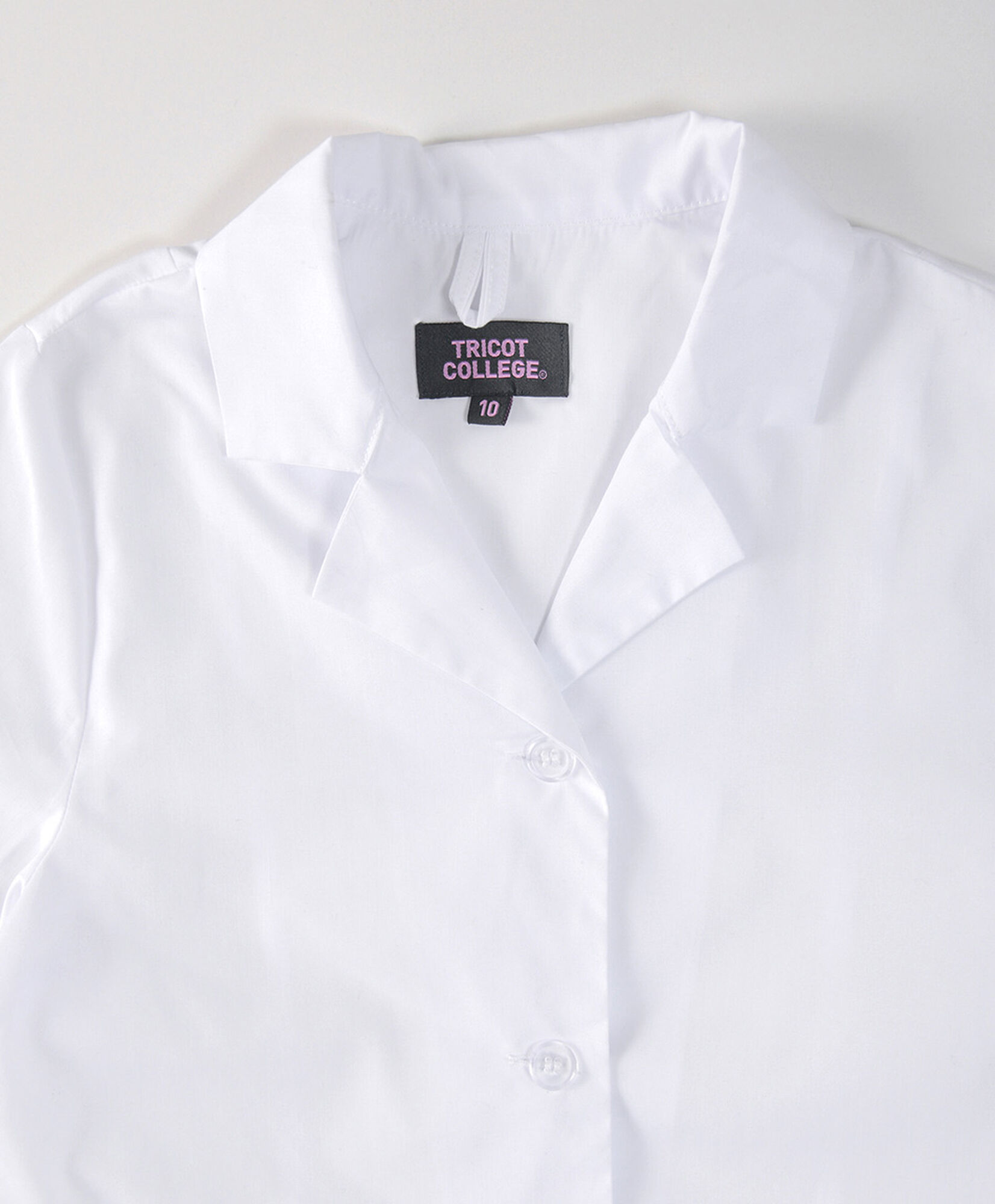 Delantal escolar blanco bolsillos Delantal escolar blanco bolsillos