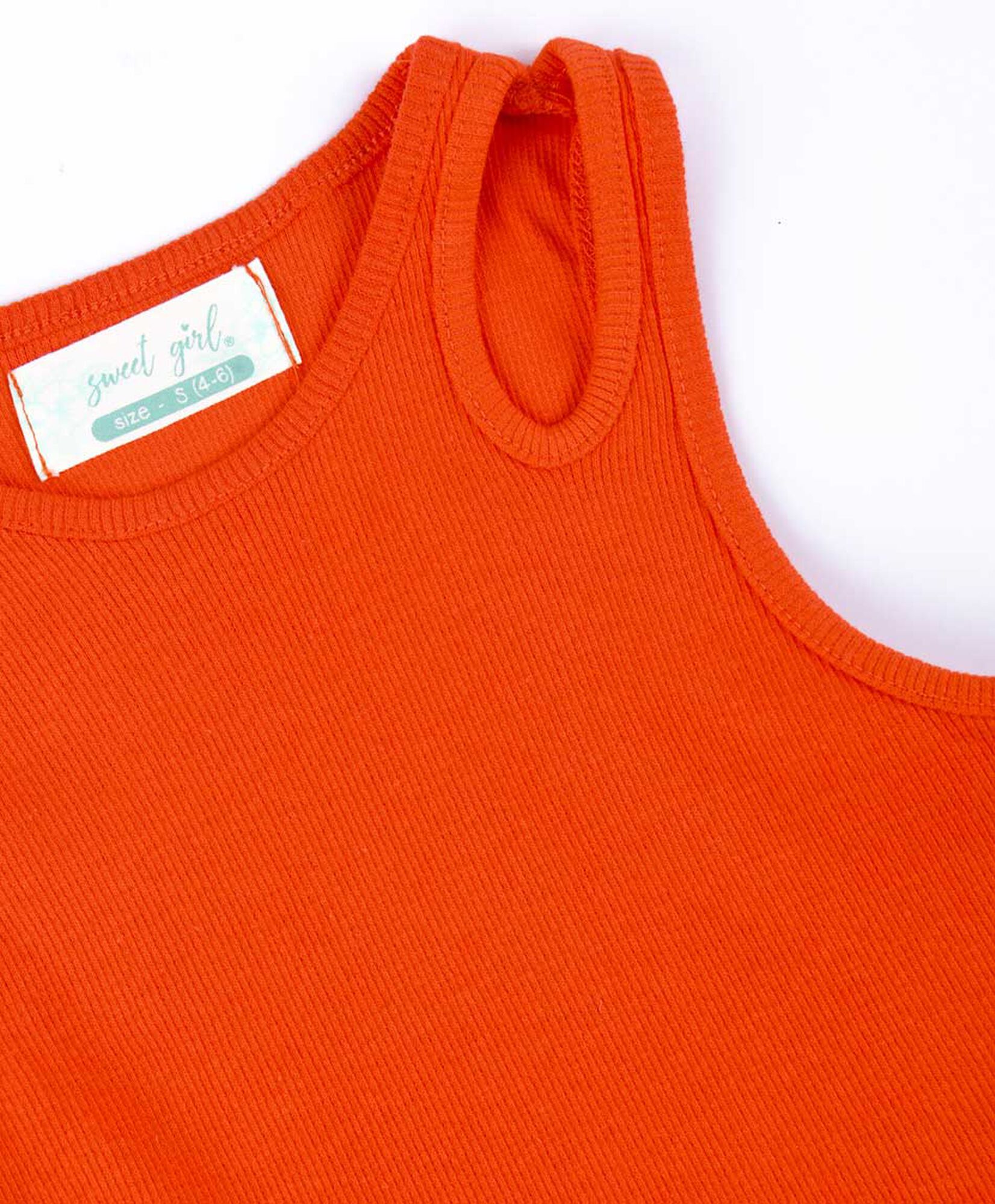 Polera niña cut out naranja Polera niña cut out naranja