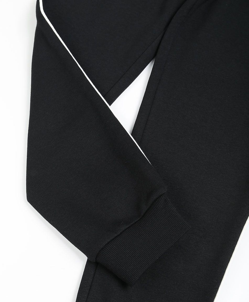 Pantal&oacute;n buzo ni&ntilde;o l&iacute;nea blanca