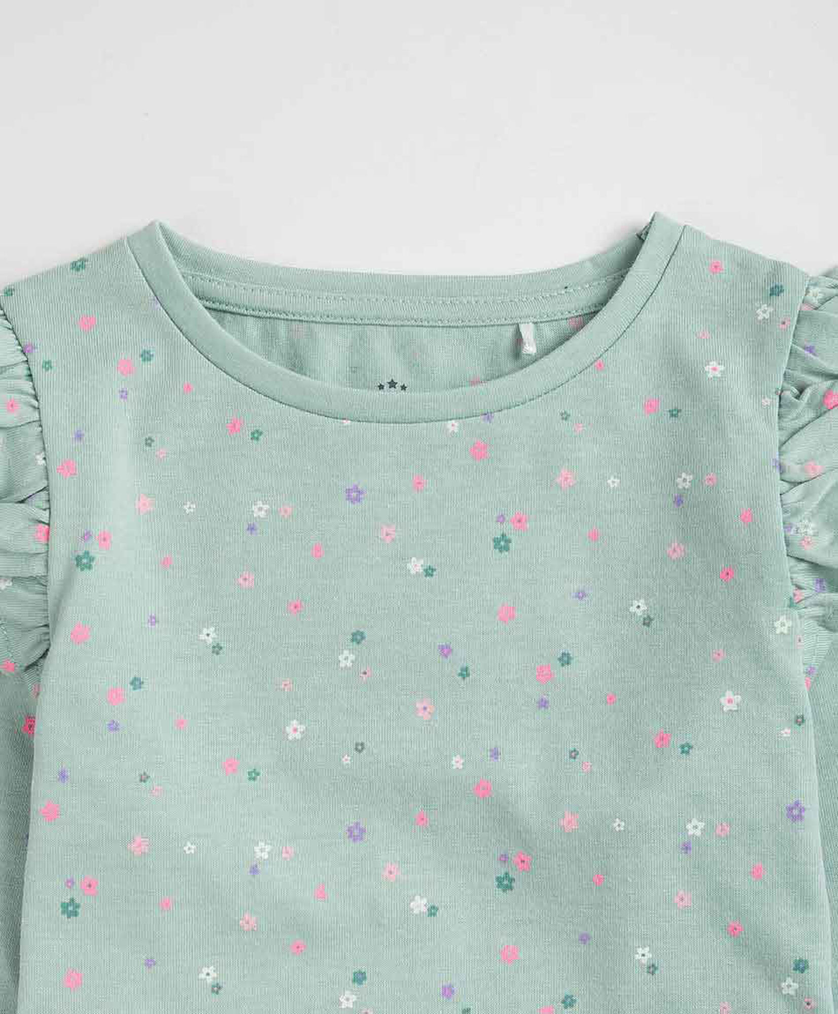 Polera bebé florcitas vuelos Polera bebé florcitas vuelos