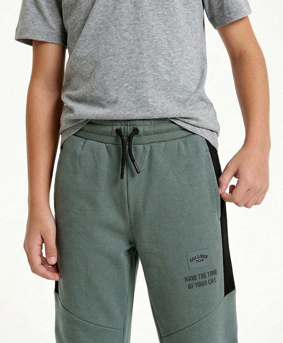 Pantal&oacute;n buzo ni&ntilde;o l&iacute;nea lateral