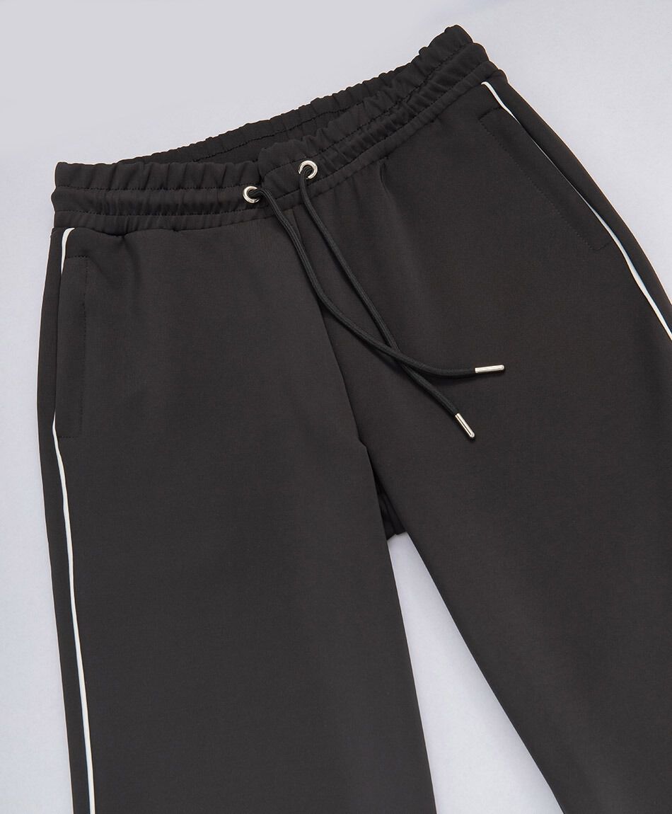 Pantal&oacute;n deportivo mujer l&iacute;neas blancas