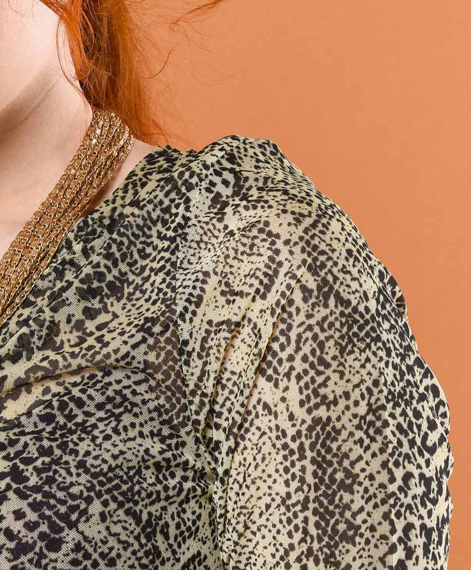 Polera mujer mesh animal print