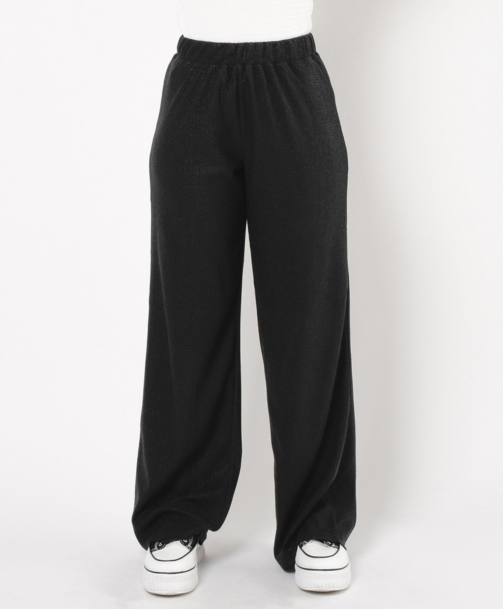 Pantalón mujer textura brillante negro Pantalón mujer textura brillante negro