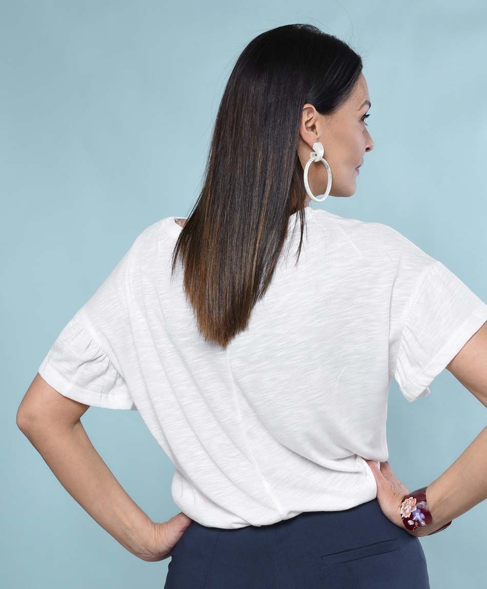 Polera oversize manga corta cuello redondo