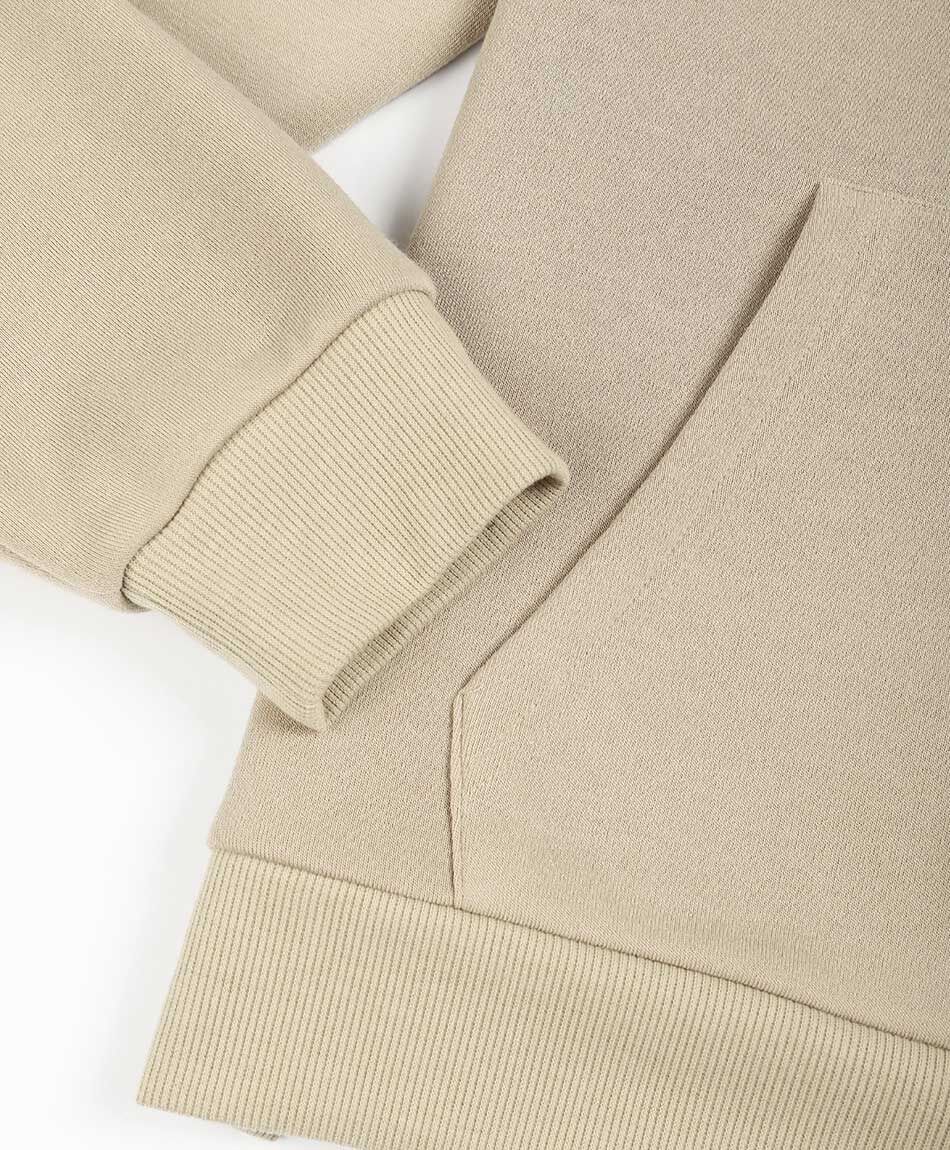 Poler&oacute;n hombre canguro zip beige