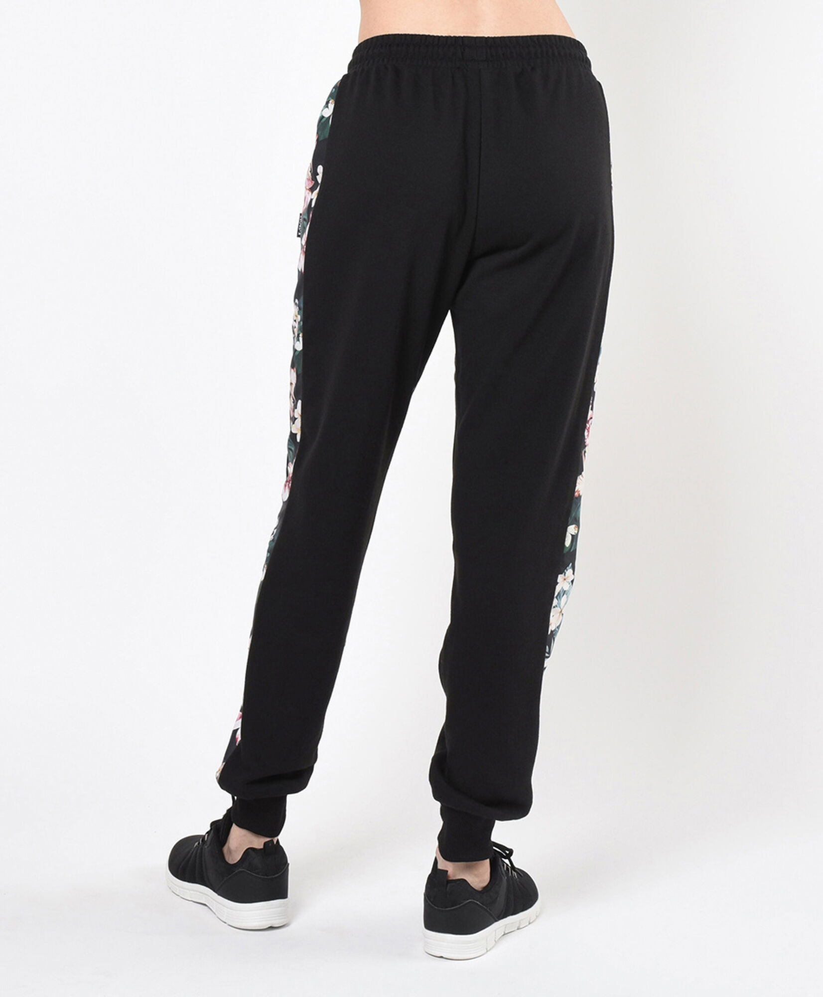 Pantalón de buzo mujer floreado lateral Pantalón de buzo mujer floreado lateral