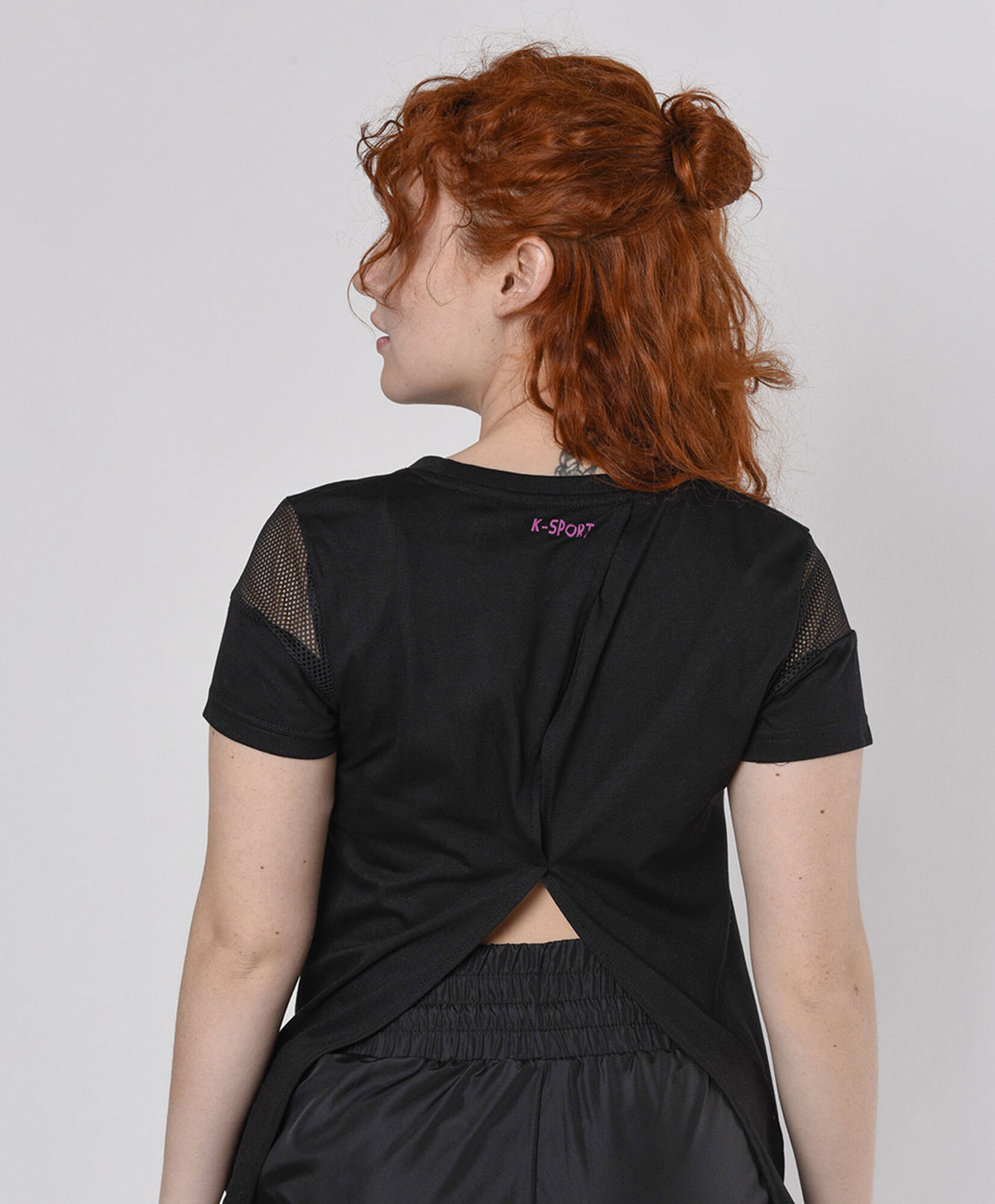 Polera deportiva mujer espalda abierta Polera deportiva mujer espalda abierta
