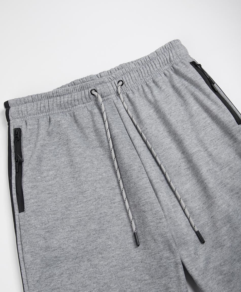 Pantal&oacute;n deportivo hombre gris l&iacute;nea lateral