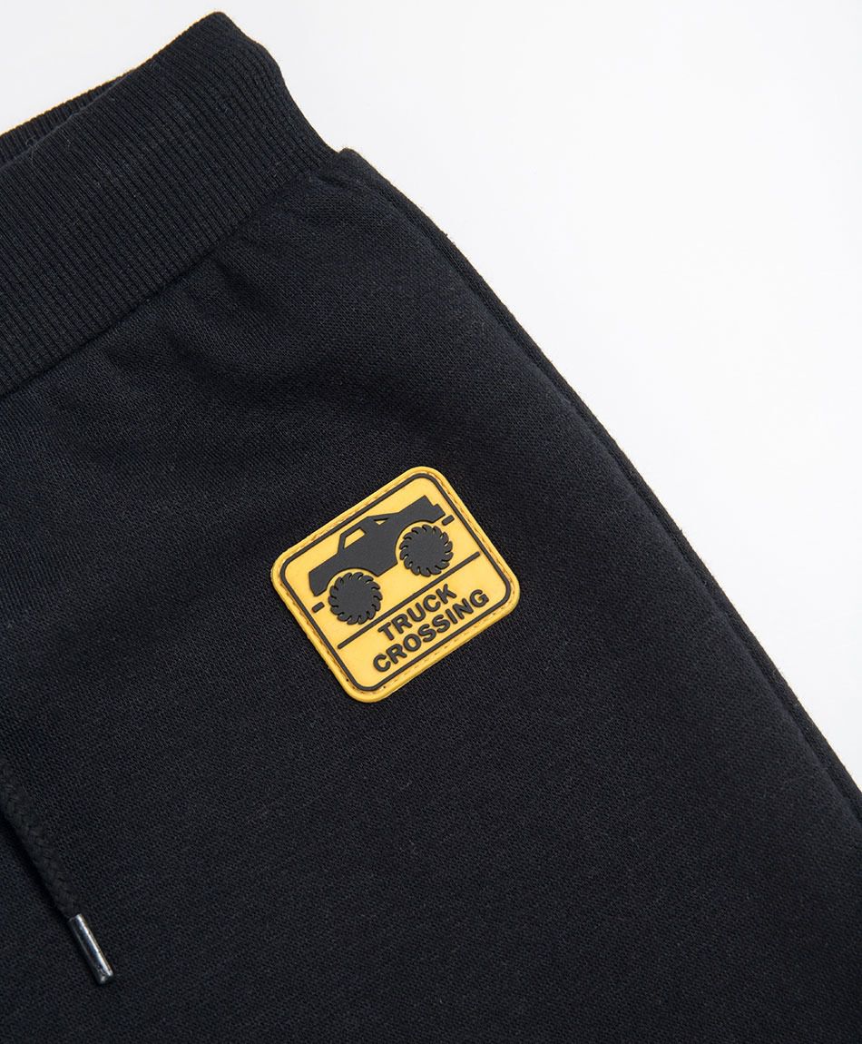 Pantal&oacute;n buzo beb&eacute; b&aacute;sico parche auto