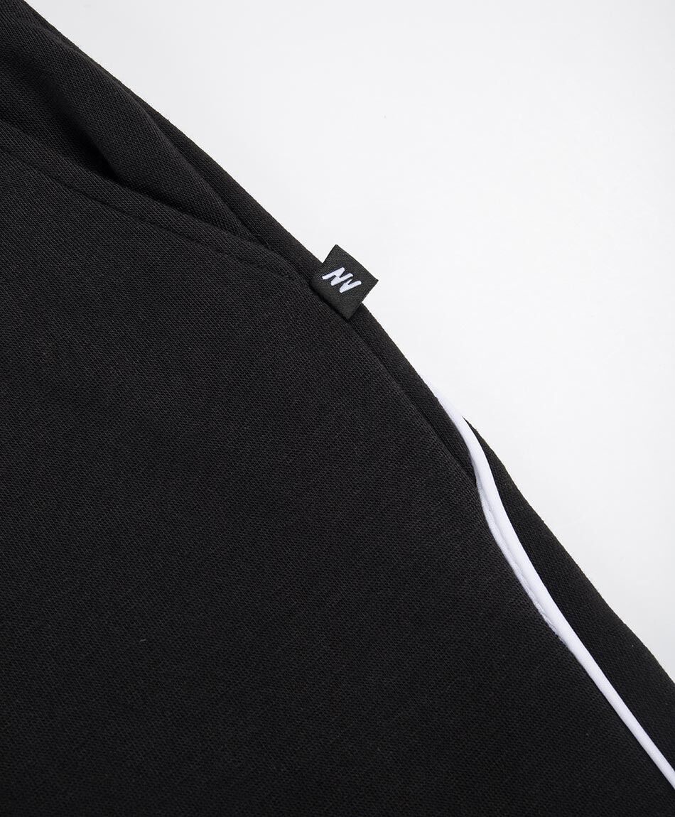 Pantal&oacute;n deportivo hombre l&iacute;neas piping