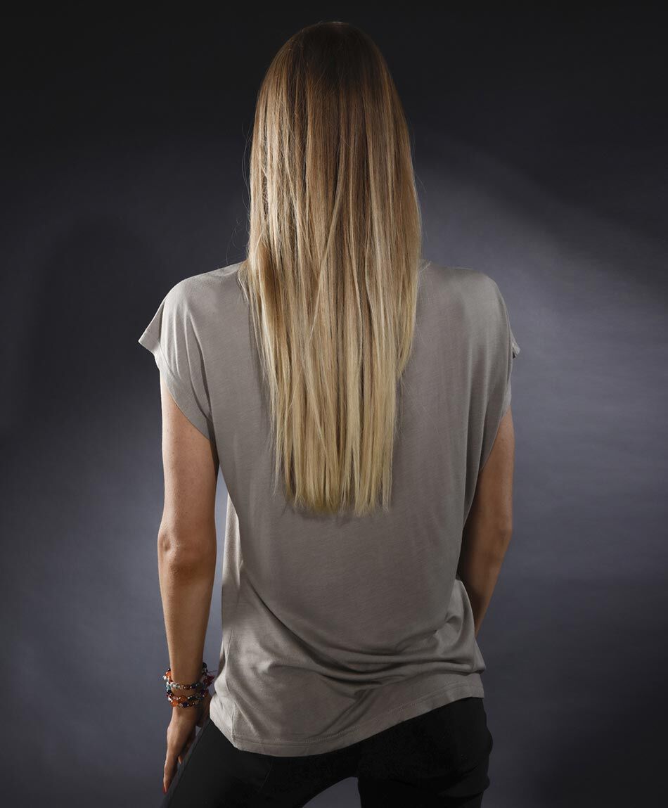 Polera oversize manga corta cuello en v