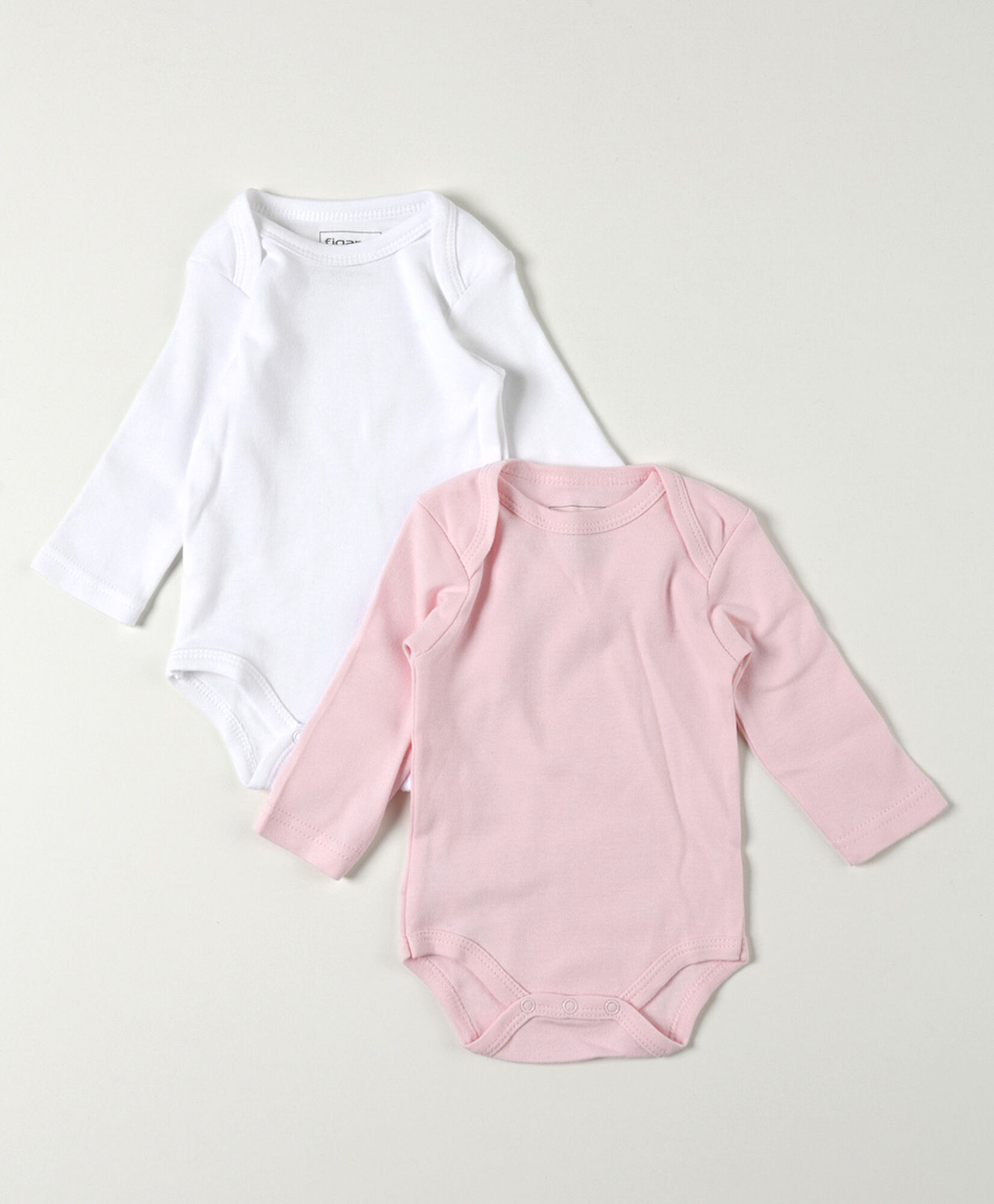 Pack 2 bodies bebé blanco y rosado manga larga Pack 2 bodies bebé blanco y rosado manga larga