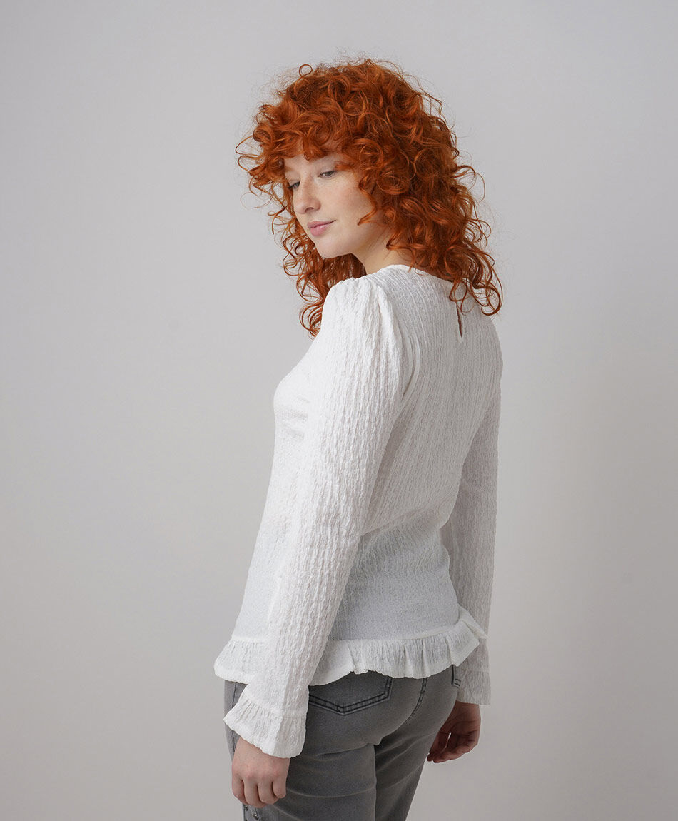 Polera mujer texturas vuelos