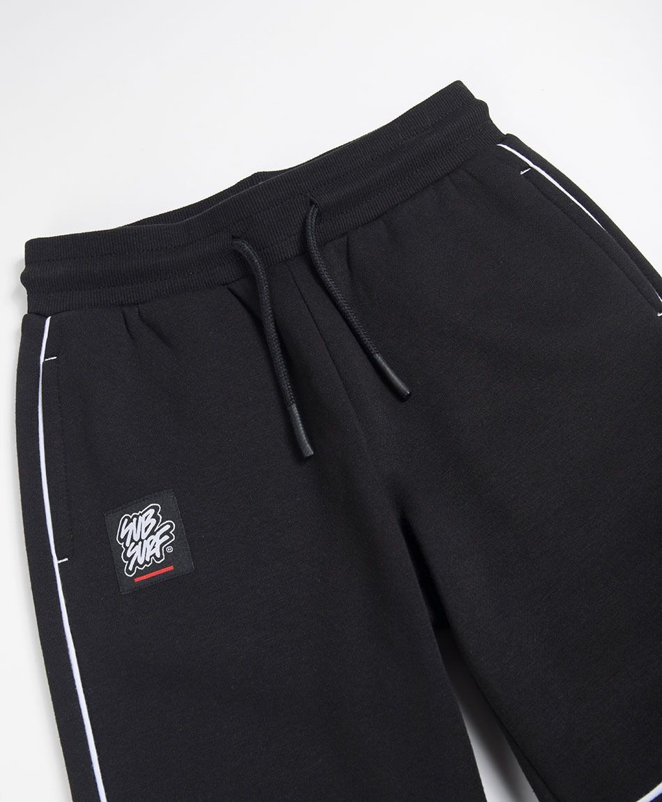 Pantal&oacute;n buzo ni&ntilde;o l&iacute;neas contraste