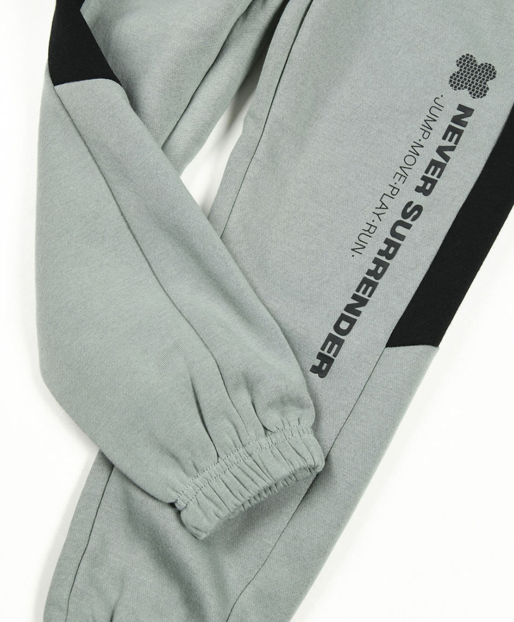 Pantalón de buzo niño bicolor frase Pantalón de buzo niño bicolor frase