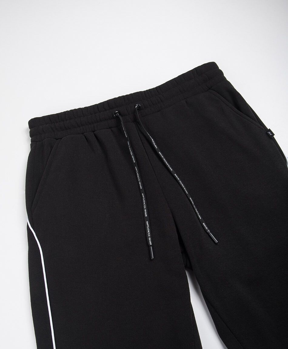 Pantal&oacute;n deportivo hombre l&iacute;neas piping
