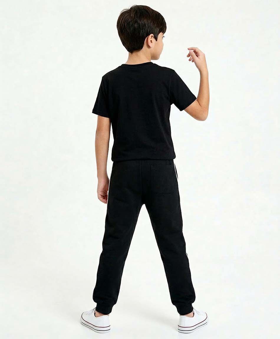 Pantal&oacute;n buzo ni&ntilde;o l&iacute;nea blanca