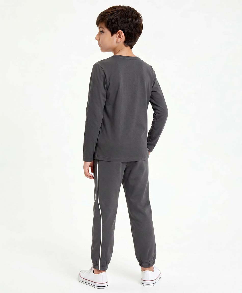 Pantal&oacute;n buzo ni&ntilde;o l&iacute;neas blancas
