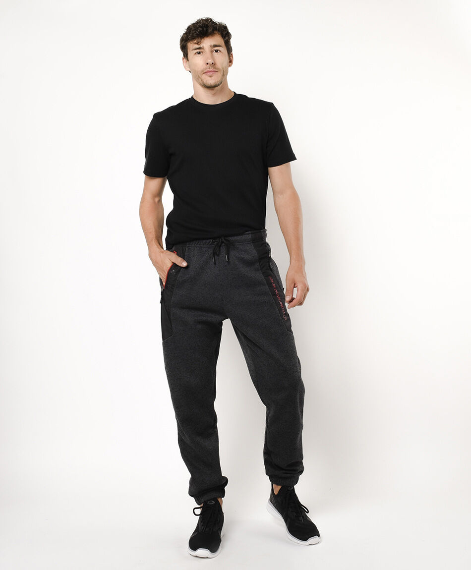 Pantal&oacute;n de buzo hombre detalles naranjos