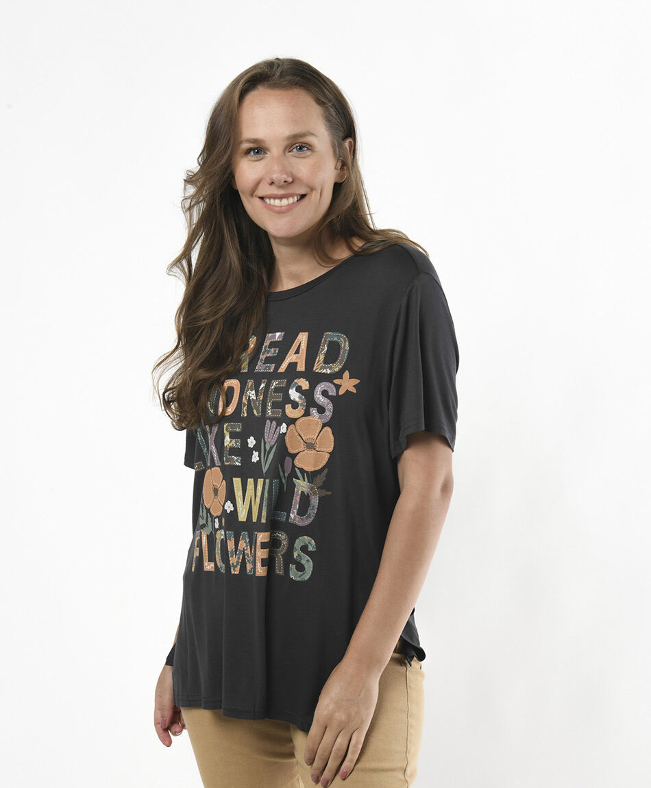 Polera mujer frase jard&iacute;n oversize