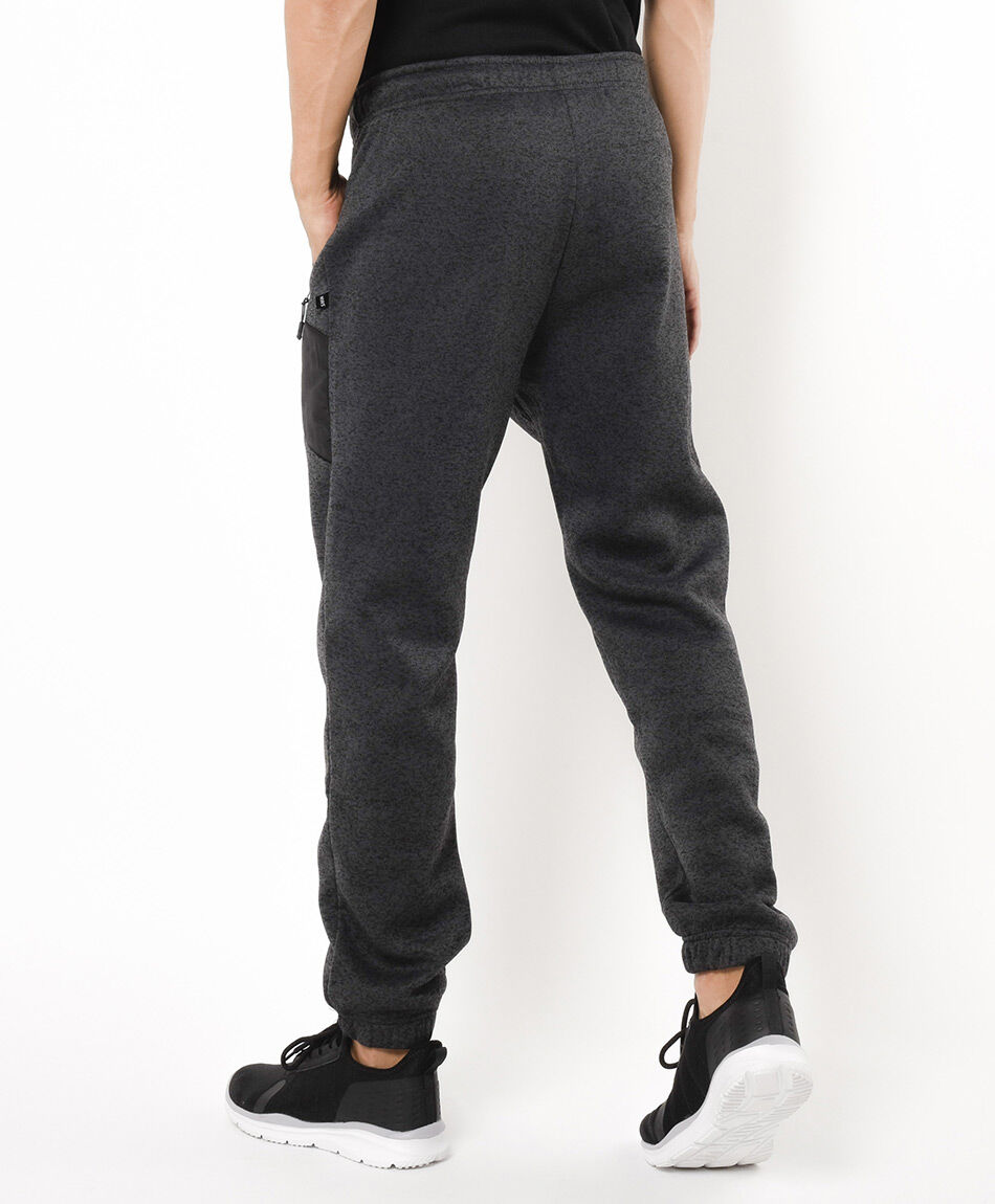 Pantal&oacute;n de buzo hombre detalles naranjos