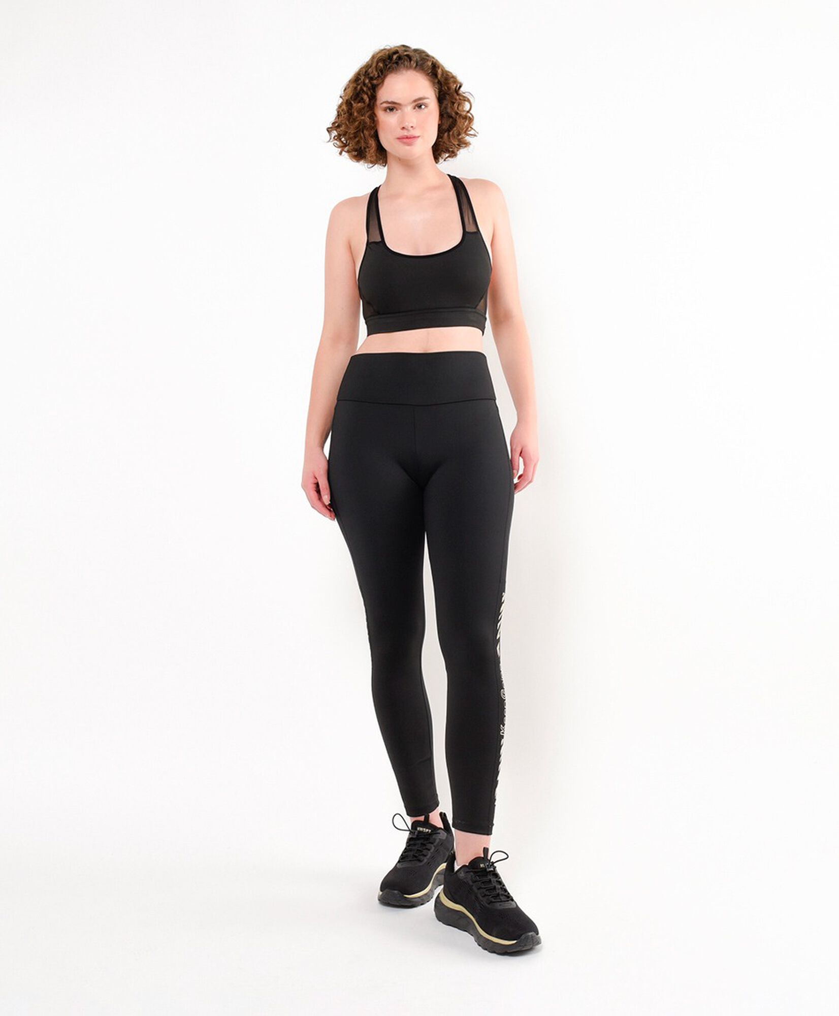 Calza deportiva mujer texto lateral Calza deportiva mujer texto lateral